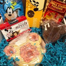 The Curated Boxes Have Snacks From All Four Disney World Parks Magic Kingdom Animal Kingdom Epcot And Hollywood Studi Disney Snacks Disney Box Disney World