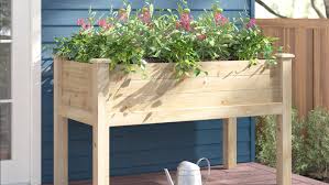 A raised bed that can move, not only that, it has trellises to support vegetables like tomatoes. The 10 Best Raised Garden Beds In 2021 According To Reviews Real Simple