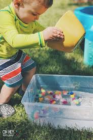 If you, like me, have a busy 2 year old in your home or work setting, you'll already know how much they like to get their hands into everything, investigating. Activities For 1 2 Year Old Toddlers Oh Hey Let S Play