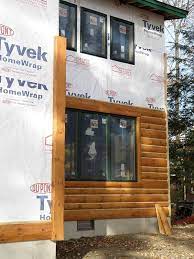 Installing cedar siding is a great choice for natural siding material. How To Install Log Siding Or Wood Paneling Yourself Woodhaven