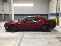 2020 Dodge Challenger Srt Hellcat Black And Red Dodge Challenger Srt Demon Painted In Octane Red Photo Taken By Deals Detroit On Instagram Classic Cars Dodge Challenger Hellcat Dodge Challenger