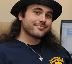 File:Derrick Coetzee in hat and necklace.jpg