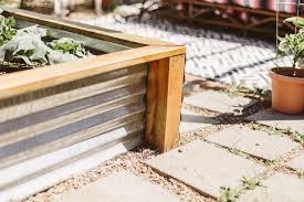 Apart from being a sustainable resource, it looks good and is great for creating a new structure for vegetable beds that will hold in compost or keep out pests. Diy Corrugated Metal Raised Beds Liz Morrow