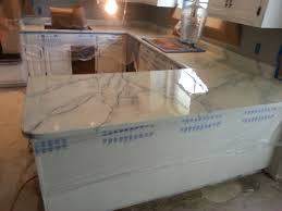 I suggest painting a couple of sample boards to get comfortable with the technique and learn what look you like. Laminate Counter Tops After Resurfaced To Look Like Carrara Marble Kitchen Remodel Countertops Countertops Laminate Countertops