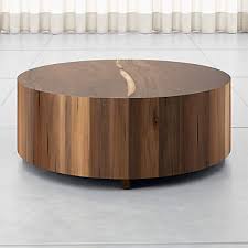Rectangular coffee tables are a natural fit in front of the sofa, while round ones make for a communal entertaining spot. Dillon Natural Yukas Round Wood Coffee Table Reviews Crate And Barrel