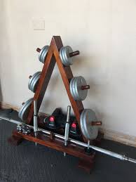 New additions to your gym: Diy Home Gym Wood Weights Rack Men S Super Hero Shirts Women S Super Hero Shirts Leggings Gadgets Diy Home Gym Gym Setup Diy Gym Equipment