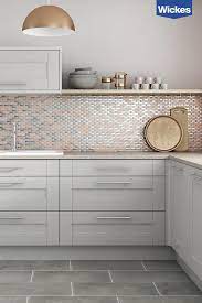 Create A Uniquely Stylish Kitchen By Combining Soft Grey Shaker Cabinets And Subtle Dusty Pastels With Grey Shaker Kitchen Kitchen Design Grey Kitchen Cabinets