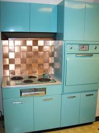 1950 S General Electric Kitchen Metal Cabinets Oven And Cook Top With A Copper Tile Back Splash Kitchen Remodel Metal Kitchen Cabinets Kitchen Remodel Small