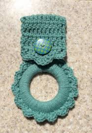 I want to make the one that has a ring you crochet around with a button attached to hang from either a stove or fridge handle. Kitchen Towel Hanger Towel Holder Sea Foam Green Hand Crochet Party Favor Shower Gift House Warming Gif Crochet Kitchen Towels Crochet Towel Hand Crochet