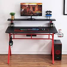 Shop our selection of tv stands and entertainment centers and find the right unit to accommodate all your devices and cut out the clutter. Homyshopy Computer Gaming Desks 2 Tired Gamer Desk With 47 2 Inch Tv Stand Cup Game Controller Holder Headphone Hook And Voice Box Storage 47 2 X 26 8 Buy Online In United Arab Emirates