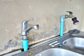 dirty faucet with kitchen sink. stock