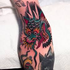 Head tattoos, dragon tattoo, head dragon tattoo, tattoo dragon head. 18 Vibrant Traditional Dragon Tattoos Tattoodo