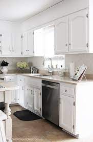 Rustic pine kitchen cabinetry aso looks exquisite when treated with a light or medium colored wood stain. Painted Pine Kitchen Cabinets