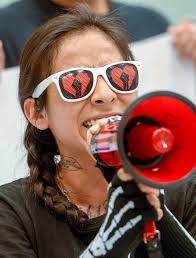 Environmental activists take over, shut down the Inland Port Authority  Board's monthly meeting