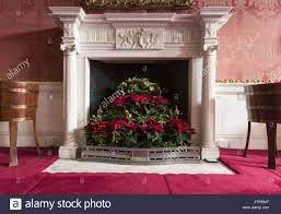 Christmas Poinsettia Fireplace High Resolution Stock Photography And Images Alamy