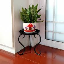 When shopping for an indoor plant stand, there are a number of factors to consider, from style and capacity to size and price. Metal Small Plant Stand Indoor Floor Flower Pot Holder Rack Round Iron Potted Plant Stands Pack Of 2 Gardening Pots Planters Container Accessories Virtualaiccer2021 Com