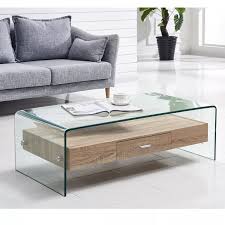 Take modern decor to the next level with a minimalist mindset. Hot Bending Modern Glass Tempered Glass Coffee Table Center Table With Wooden Drawer For Living Room Buy Tempered Glass Coffee Table Coffee Table Tea Table Product On Alibaba Com