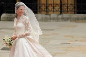 Fiona cairns, stands next to the wedding cake that she and her team made for prince william and his wife kate. 10 Things You Didn T Know About Kate Middleton S Wedding Dress Sarah Burton Designs The Royal Gown