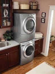 Full size stackable washer dryer. A Home For The New Economy Design Show Homes Building Science Builder Mag Laundry Room Storage Laundry Room Storage Shelves Laundry Room Decor