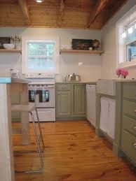 The Cottage At Plott Creek Kitchen And Dining White Kitchen Paint White Kitchen Appliances Green Cabinets