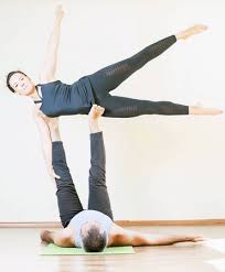 Check spelling or type a new query. Outdoor Shot Of Young Man And Woman Doing Yoga In Pair Couple Doing Acrobatic Yoga Exercise At Park Stock Photo Picture And Royalty Free Image Image 65496832