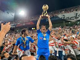 ويلتقي الأهلي بطل الدوري المصري الممتاز، مع الزمالك بطل كأس مصر، في لقاء السوبر بالإمارات على إستاد محمد بن زايد بمدينة أبو ظبي. Ø¬Ù…Ø§Ù‡ÙŠØ± Ø§Ù„Ø²Ù…Ø§Ù„Ùƒ ØªØ­ØªØ´Ø¯ ÙÙŠ Ù…Ø·Ø§Ø± Ø§Ù„Ù‚Ø§Ù‡Ø±Ø© Ø§Ø³ØªØ¹Ø¯Ø§Ø¯Ø§ Ù„Ù„Ø§Ø­ØªÙØ§Ù„ Ø¨ÙƒØ£Ø³ Ø§Ù„Ø³ÙˆØ¨Ø±
