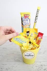 Add all the items to the basket, arranging them so that they look nice. Diy Yellow Sunshine Gift Ideas And Free Printables Aubree Originals