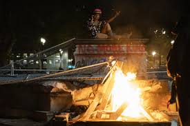 A limo is set on fire as protesters clash with police in washington dc image: 50 Days Of Protest In Portland A Violent Police Response This Is How We Got Here Opb