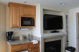 Kenisahome february 16, 2018 no comment kenisa tips & inspiration. Kitchen Area Next To Tv And Electric Fireplace Picture Of Ocean Club On Smugglers Beach South Yarmouth Tripadvisor