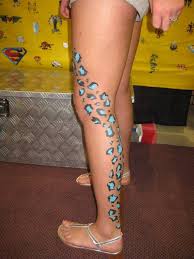 Hand tattoos for girls dope tattoos for women chest tattoos for women tiger print tattoos leopard tattoos elegant tattoos pretty tattoos tatuajes animal print dark skin tattoo. Blue Ink Leopard Skin Tattoo Design On Girl Leg Sleeve Truetattoos
