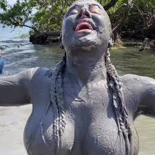 Playboy cover model stuns tourists rubbing herself down in volcano mud bath  - Daily Star