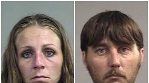 Police: Couple left children home alone to go shoplift at Meijer