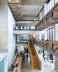 Manchester Metropolitan University Art School Extension With Wooden Stairs And Bridges By Feilden Clegg Bradley Studios Art School Stair Art Atrium Design