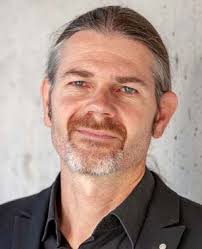 Augmented Reality for Future Mobility: Insights from a Literature Review  and HCI Workshop