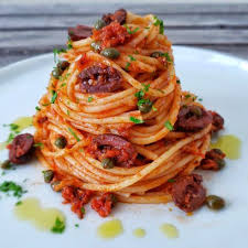 spaghetti alla puttanesca recipe spaghetti alla puttanesca puttanesca featured recipe