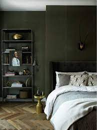 A darker shade of green can work in a bedroom, too. Dark Green Bedroom Walls In A Moody Masculine Soho Loft Via Thouswellblog Chambre A Coucher Design Chambre Moderne Chambre Design