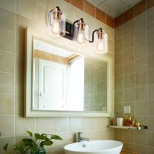 A smooth chrome finish plate anchors this piece above sinks and mirrors with a simple horizontal bar extending to support an even arrangement of light sources. Buy Solfart 3 Head Vintage Bath Vanity Light Wall Bathroom Over Mirror Modern Glass Shade Light Fixtures 3 Lights Exclude Bulb Online In Indonesia B07vx6zkt5