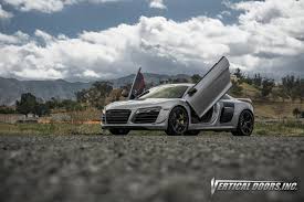 One kit open door 30 degrees and lift the other you lift right up. R8 Lambo Door Kit Audi R8 Forums