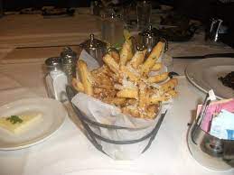 Pin By Nikki Craven Jones On Best Thing I Ever Ate Truffle Fries Parmesan Truffle Fries Cooking Recipes