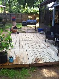 We Moved Into A House That Had A Dilapidated Patio And A Serious Mud Issue Our Solution Pallets As You Can See From Pallet Decking Patio Pallet Outdoor