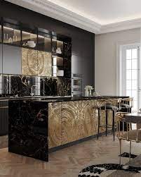 Two big ovens are set in a dedicated area, while the large and long island provides additional working surface. Searching For Inspiration Have A Look At These Luxury Kitchen Ideas