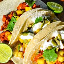 These weeknight fish tacos are a recipe the whole family will want for dinner! Yucatecan Fish Tacos With Green Peach Salsa