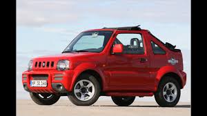 Overcome muddy pits, manoeuvre through. Power Of Music Suzuki Jimny Cabrio Rock Am Ring