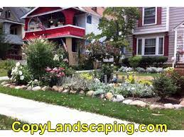 Love the two matching weathered garden pots or plants on each side of the door! Gorgeous Front Yard Landscaping Ideas Ontario Canada Front Yard Landscaping Design Front Yard Landscaping Front Yard Landscaping Pictures