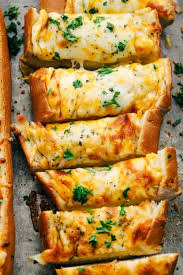 Cheesy Garlic Bread Is So Simple To Make With Loads Of Cheese And That Soft Bread On The Ins In 2020 Cheesy Garlic Bread Cheesy Garlic Bread Recipe Garlic Bread Recipe