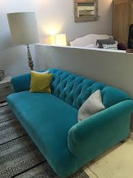 Framed by angled arms, dixie's tight back includes a single row of button tufting for a look that's both modern and sophisticated. Blues To Lift The Blues Style Guile
