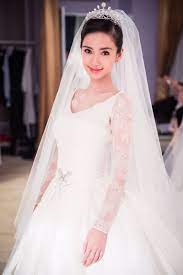 While she is relatively unknown in the west, angelababy is a hit in china. Angelababy Wedding Dress Photos See Angelababy S Dior Gown Fashion Gone Rogue