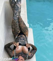 Inked Lorena ignites your senses with these mesmerizing nudes