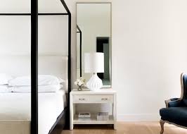 The bedroom mirror ideas can be taken from some mirror design specialist. Tall Silver Mirror Over White Nightstand Transitional Bedroom