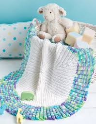 Knitting a blanket can be a big undertaking! Knitting Pattern For Ruffled Circle Baby Blanket Baby Blanket Knitting Pattern Baby Knitting Patterns Baby Blanket Pattern